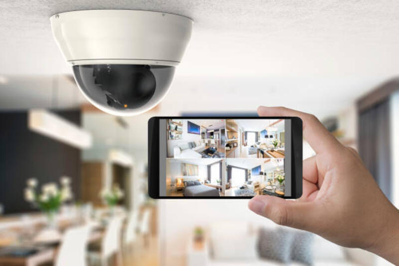 mobile connect with security camera hand holding 3d rendering mobile connect with security camera indoor cctv stock pictures, royalty-free photos & images