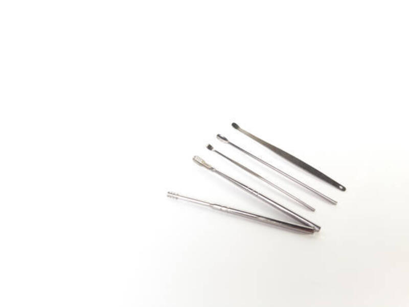 Stainless steel ear cleaning tools set Stainless steel ear cleaning tools set arranged in a fan shape on a white background. Functional and sleek personal hygiene kit cleaning ear stainless stock pictures, royalty-free photos &amp; images