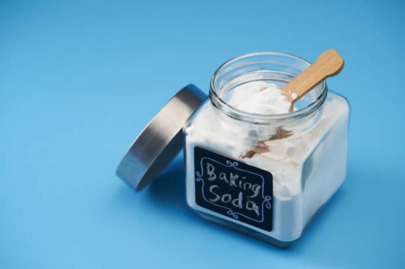close-up-of-baking-soda-in-jar-on-table-against-blue-background.jpg (612×408)