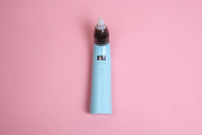 baby nasal aspirator dengan latar belakang merah muda. flat lay. copyspace - electric baby nasal aspirator potret stok, foto, &amp; gambar bebas royalti