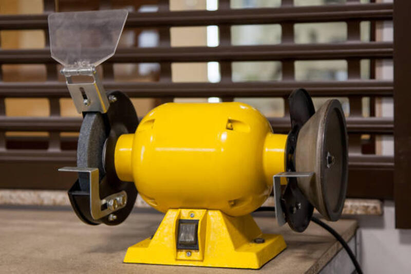 Yellow grinder, grinding machine"n Yellow grinder, grinding machine"n bench grinder stock pictures, royalty-free photos &amp; images