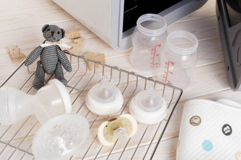 sanitizing the baby things in UV Sterilizer Sanitizing the baby things in UV Sterilizer and dryer, new technology for sanitize the baby things by UV Light. UV Sterilizer &amp; Dryer stock pictures, royalty-free photos &amp; images