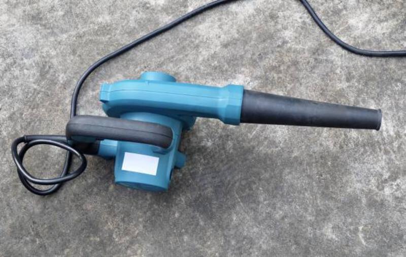 alat blower udara biru atau blower daun - hand blower potret stok, foto, &amp; gambar bebas royalti