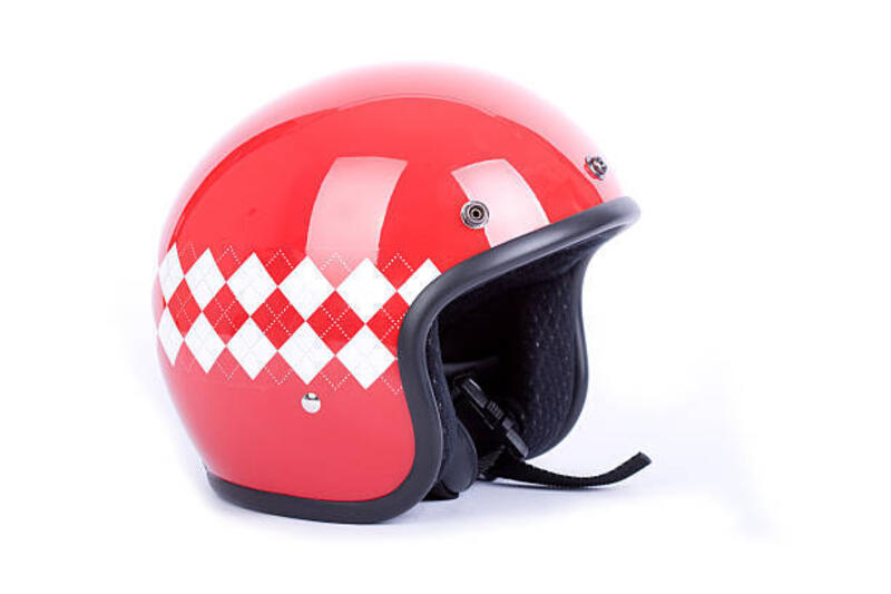 Red motorcycle helmet with a white and red diamond pattern retro motorcycle helmet retro helmet stock pictures, royalty-free photos &amp; images